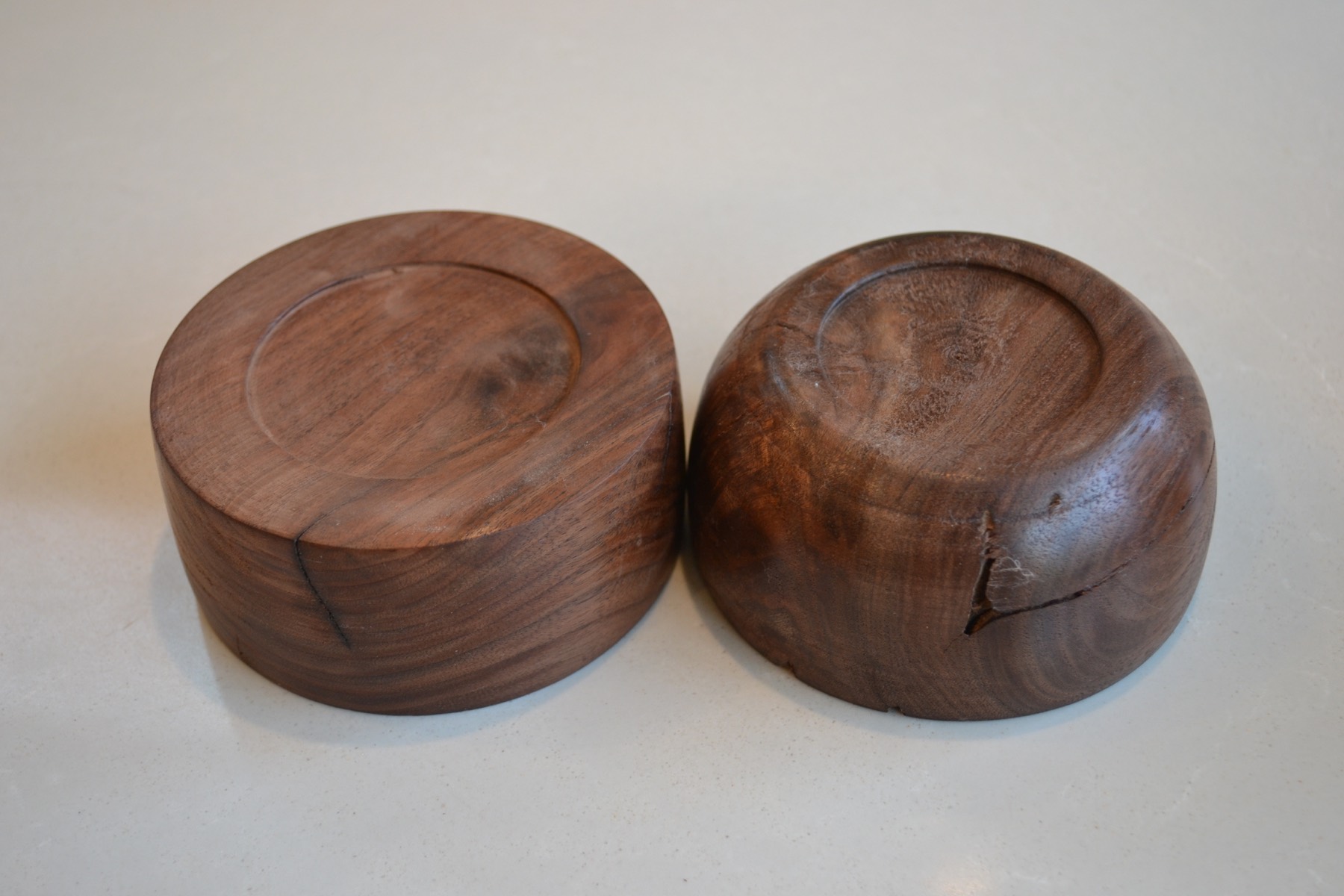 Bottom details of two lathe turned black walnut bowls